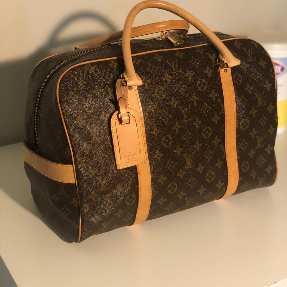 LOUIS VUTTON DUFFLE BAG